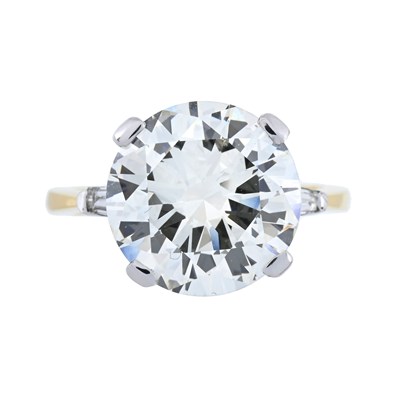 Lot 161 - An 18ct gold brilliant-cut diamond ring, with tapered baguette-cut diamond shoulders