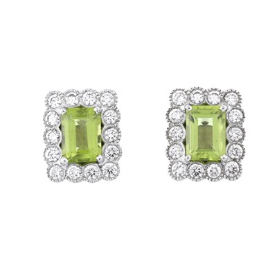 Lot 80 - A pair of peridot and brilliant-cut diamond cluster earrings