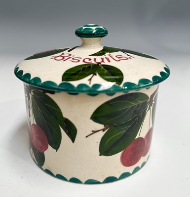 Lot 181 - A Wemyss Biscuit barrel with lid, decorated...