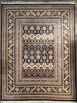 Lot 703 - A Caucasian knotted wool rug, multi-pointed...