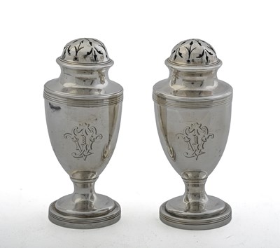 Lot 294 - A pair of silver pepperettes