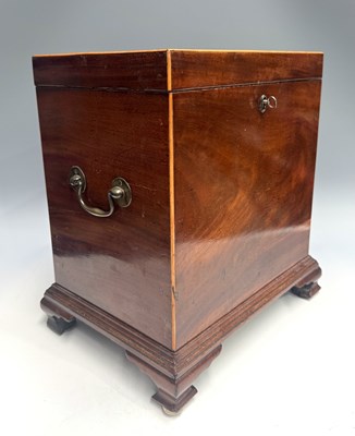 Lot 388 - A George III mahogany cellarette, circa 1800,...