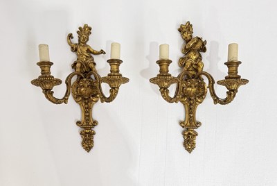 Lot 245 - A pair of gilt resin double wall sconces with...