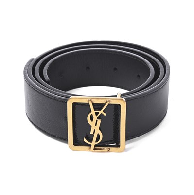 Lot 569 - Yves Saint Laurent, a Cassandre belt.