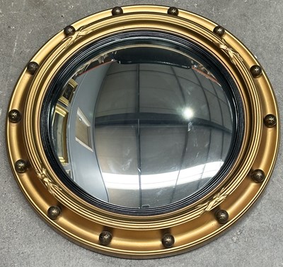 Lot 713 - A Regency style convex wall or butler's mirror,...