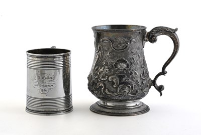Lot 307 - Two English silver mugs, to include a George...
