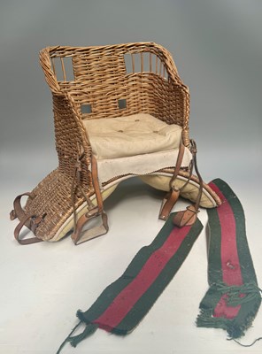 Lot 391 - A child's wicker chair saddle with leather...