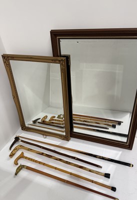 Lot 715 - A collection of walking sticks, to include: a...