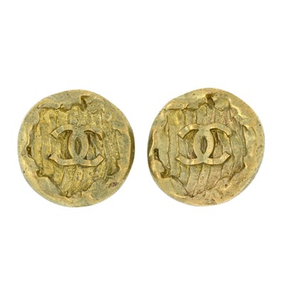Lot 331 - Chanel, a pair of CC logo disc clip-on earrings.