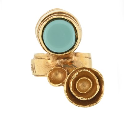 Lot 570 - Yves Saint Laurent, a gold-plated paste abstract ring.