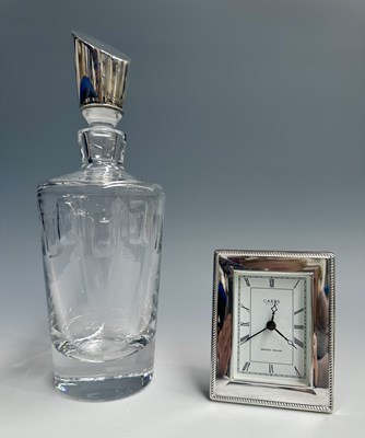 Lot 123 - An Elizabeth II silver-mounted glass decanter,...