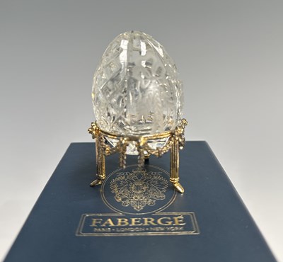 Lot 169 - A modern Faberge glass egg on a gilt stand,...