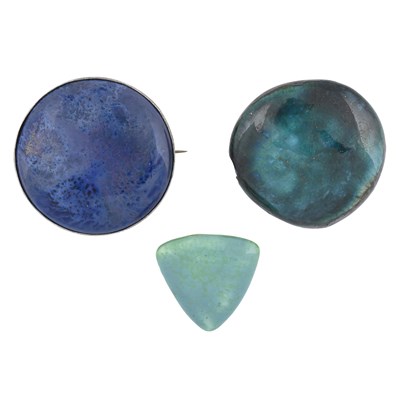 Lot 305 - Ruskin, three various Arts and Crafts brooches,...