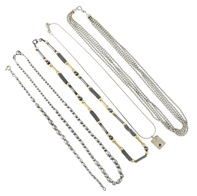 Lot 285 - Four silver and white metal necklaces, a garnet and cubic zirconia pendant and a bracelet