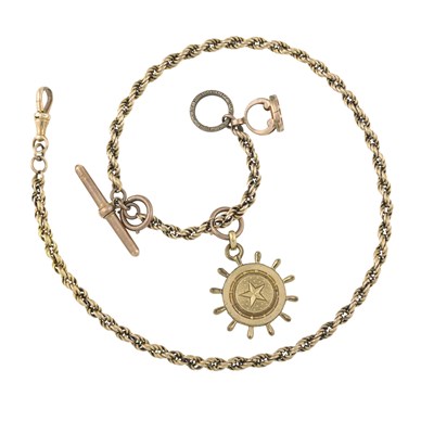 Lot 288 - An early 20th century 15ct gold Albert chain, suspending a compass, T-bar and carnelian fob