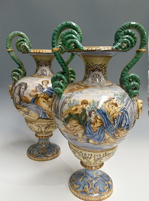 Lot 118 - Two faience maiolica urns, coiled serpent...