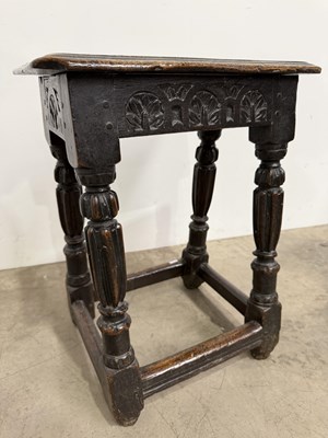 Lot 452 - A 17th century oak joint stool, rectangular...
