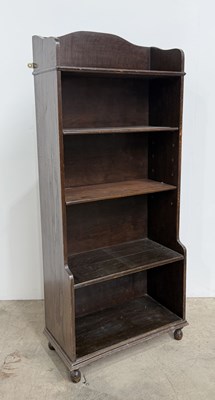 Lot 470 - An early 20th century oak waterfall bookcase...