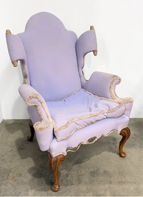 Lot 485 - An early 20th century walnut wingback armchair...
