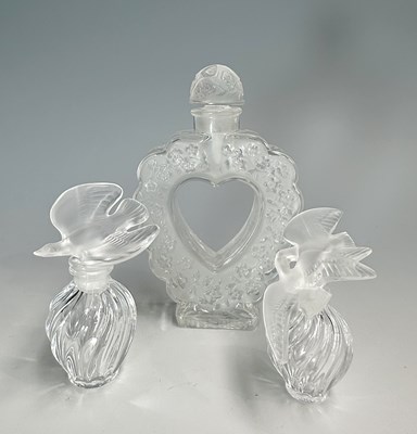 Lot 120 - Lalique for Nina Ricci, three perfume bottles,...