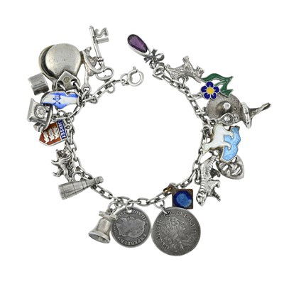 Lot 243 - A silver charm bracelet