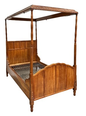 Lot 520 - An early to mid 20th century walnut single...