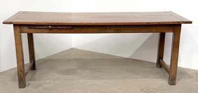 Lot 499 - A 19th century French cherry wood table on an...