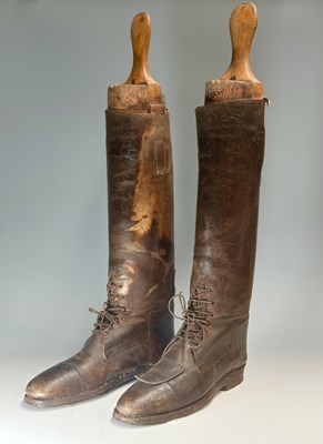 Lot 173 - A pair of early 20th-century knee-length brown...