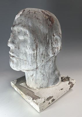 Lot 146 - A modernist style lead head bust on a square...