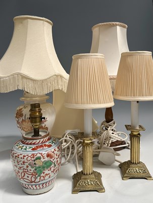 Lot 40 - A collection of table lamps: a pair of brass...