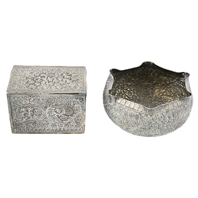 Lot 334 - Indian white metal: a hinged box with gilt...