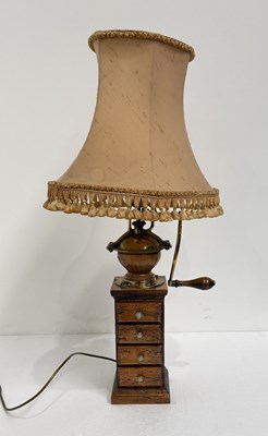Lot 176 - A 19th century cast iron and brass coffee...