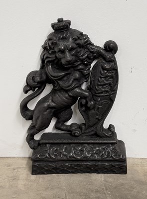 Lot 143 - A heavy cast iron crowned lion doorstop in the...