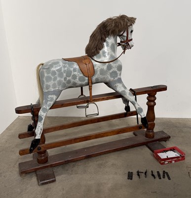 Lot 429 - A traditional wooden rocking horse on stand,...