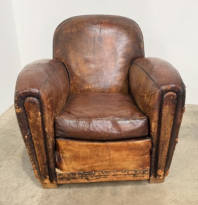Lot 501 - A 1920's/30's leather club armchair, h: 60cm,...