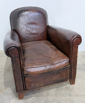 Lot 503 - A 1930's leather club armchair with studwork...