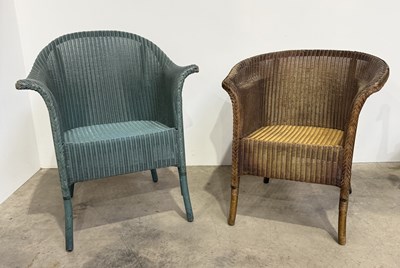 Lot 518 - Two Lloyd Loom woven armchairs, a blue/green...