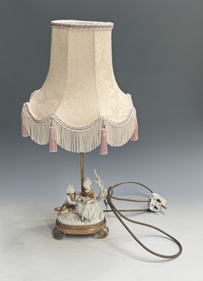 Lot 178 - A table lamp with an ovoid base, surmounted by...