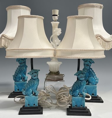 Lot 41 - Five table lamps, two pairs surmounted by...