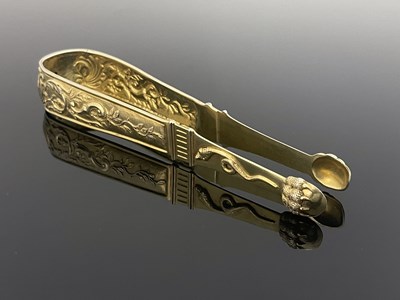 Lot 11 - A large pair of Continental silver gilt sugar...