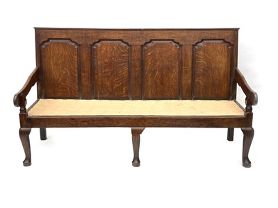 Lot 600 - A George III country oak hall settle, circa...