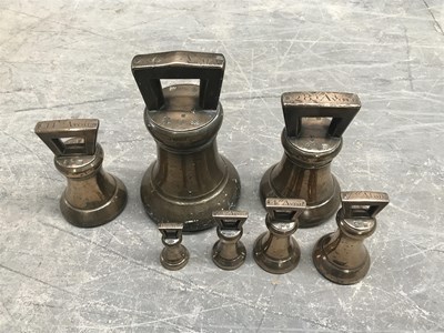 Lot 199 - A graduated set of seven George III bronze...
