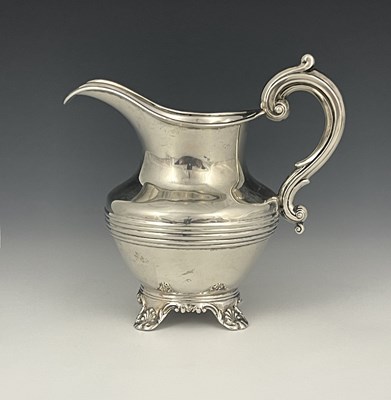 Lot 11 - A Victorian silver cream jug, of squat...