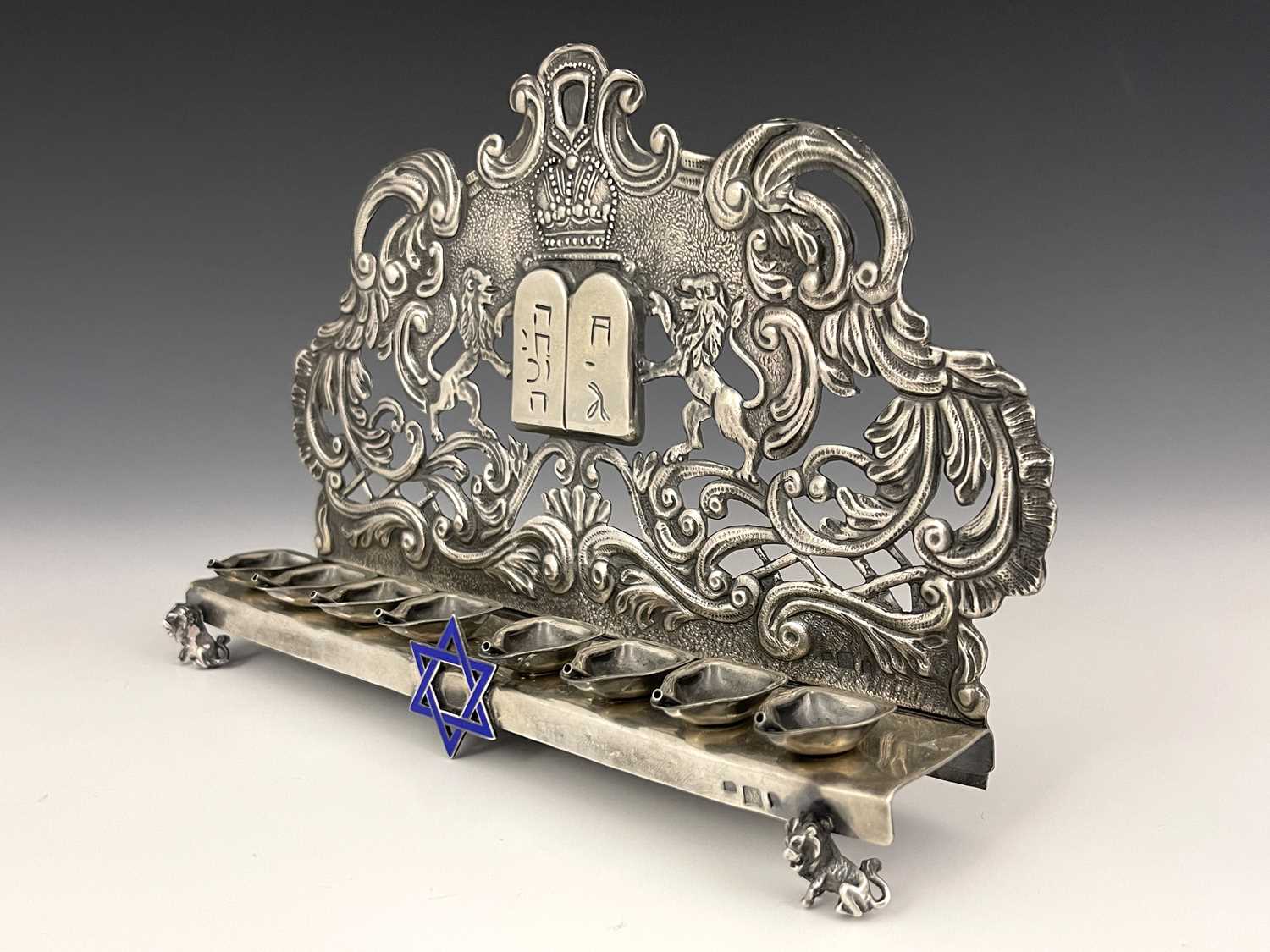 Lot 48 - A Russian silver coloured metal Hanukkah lamp,...