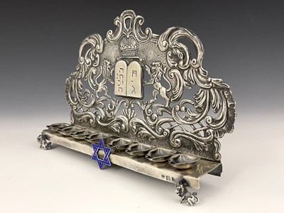 Lot 48 - A Russian silver coloured metal Hanukkah lamp,...