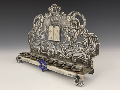 Lot 48 - A Russian silver coloured metal Hanukkah lamp,...
