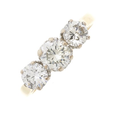 Lot 62 - An 18ct gold diamond three-stone ring