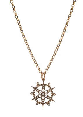 Lot 16 - An early 20th century 9ct gold split pearl star pendant, with chain