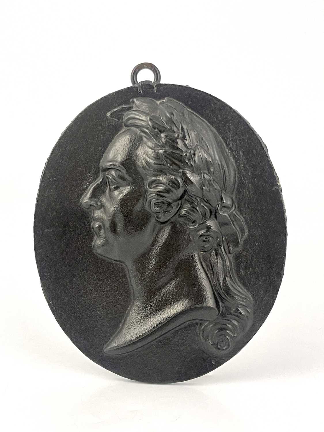 Lot 201 - A 19th Century Grand Tour oval cast iron...