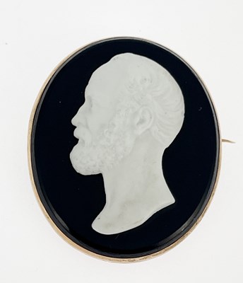 Lot 2 - A 19th century gold hardstone brooch
